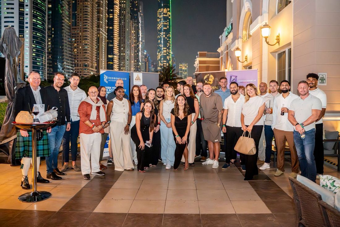 Guests gathered on a Dubai terrace at an evening event