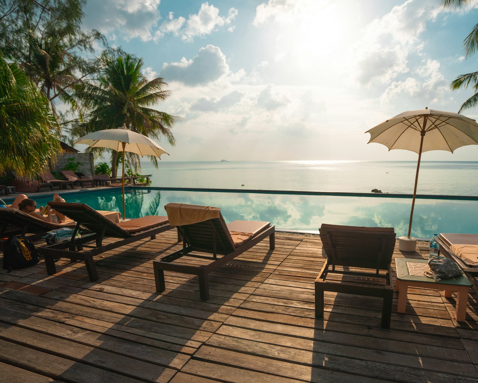 Poolside loungers looking out to the sea